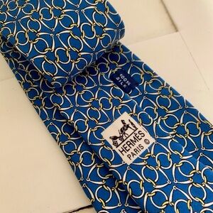 HERMÉS Neck Tie Blue with Taupe + Gold Horse Bit Pattern